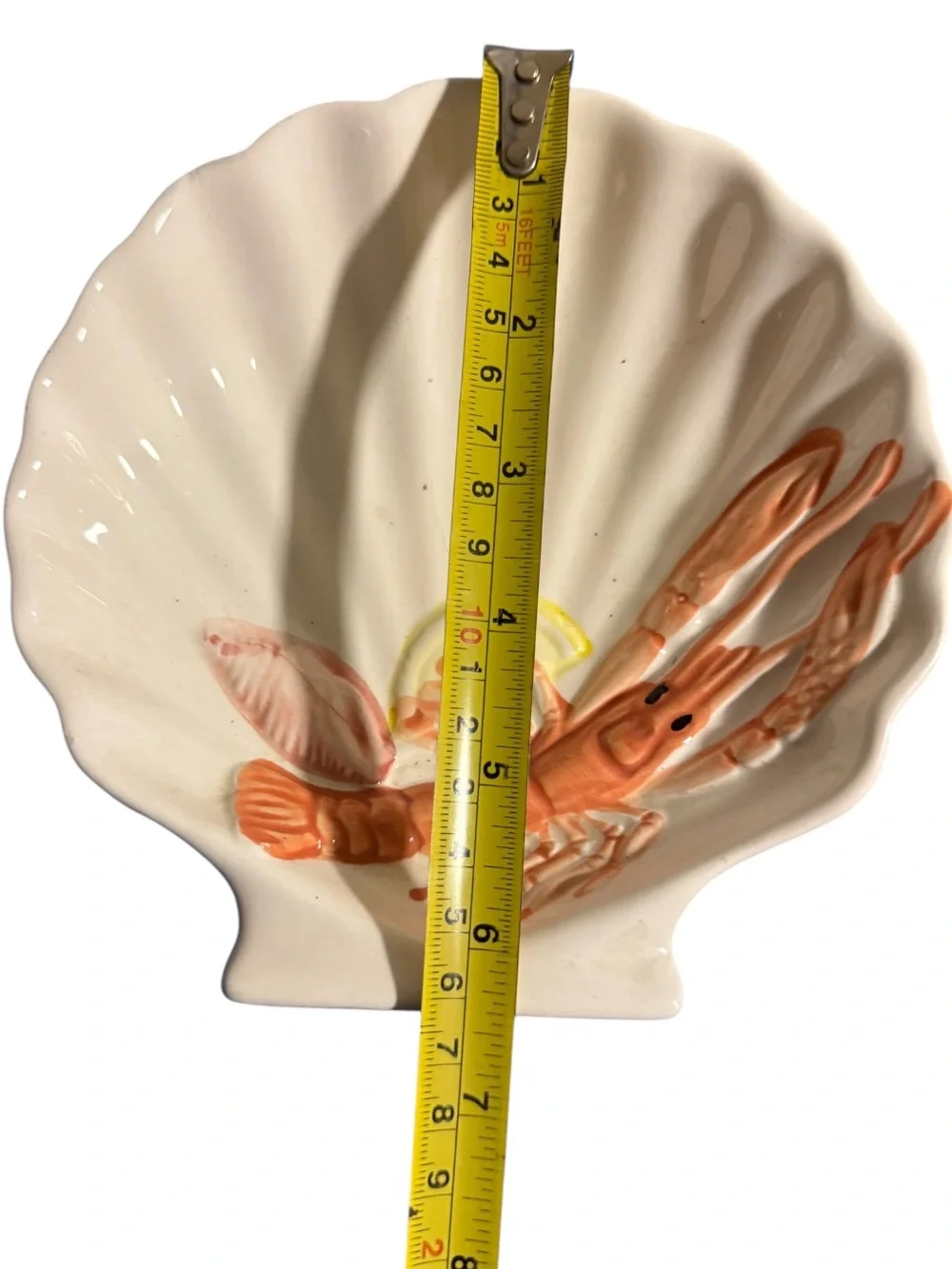 vintage Bassano ceramic lobster dish shaped like a scalloped seashell, featuring